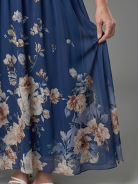 Clarissa | Sleeveless Midi Dress with V Neckline and Soft Floral Hem