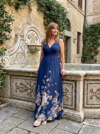 Clarissa | Sleeveless Midi Dress with V Neckline and Soft Floral Hem