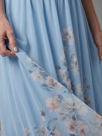 Clarissa | Sleeveless Midi Dress with V Neckline and Soft Floral Hem